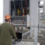 Field service technician vacuum interrupter testing wind farm